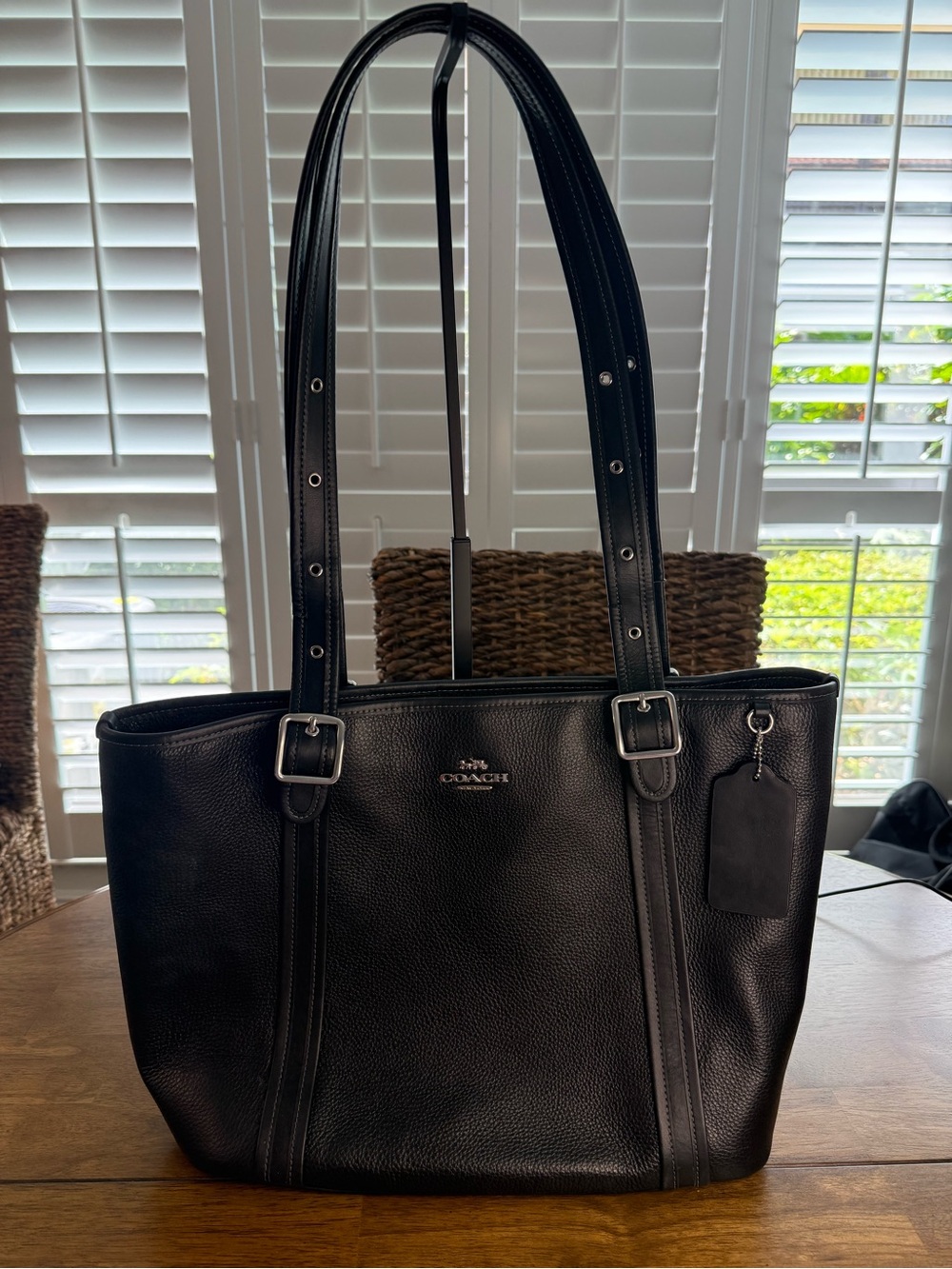Coach Black Leather Ashton Tote Bag with Adjustable Straps and zipper closure